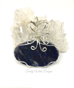 Blue Sodalite Pendant Wire Wrapped In Sterling Silver